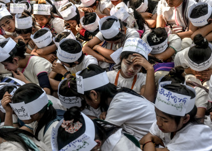 Young Karen women in Luthaw Township demonstrating against military road-building close to where environmental activist Saw Oo Mu was shot dead by Tatmadaw troops in 2018